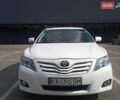 Белый Тойота Камри, объемом двигателя 2.49 л и пробегом 310 тыс. км за 6500 $, фото 1 на Automoto.ua