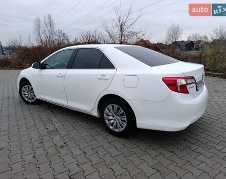 Белый Тойота Камри, объемом двигателя 2.49 л и пробегом 174 тыс. км за 9700 $, фото 4 на Automoto.ua