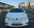 Белый Тойота Камри, объемом двигателя 2.49 л и пробегом 220 тыс. км за 10500 $, фото 1 на Automoto.ua