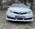 Белый Тойота Камри, объемом двигателя 2.49 л и пробегом 145 тыс. км за 9399 $, фото 1 на Automoto.ua