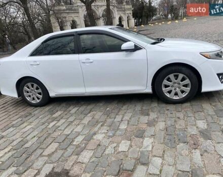 Белый Тойота Камри, объемом двигателя 2.49 л и пробегом 135 тыс. км за 9300 $, фото 1 на Automoto.ua