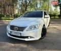 Белый Тойота Камри, объемом двигателя 2.49 л и пробегом 252 тыс. км за 12999 $, фото 1 на Automoto.ua