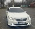 Белый Тойота Камри, объемом двигателя 2.5 л и пробегом 273 тыс. км за 12200 $, фото 1 на Automoto.ua