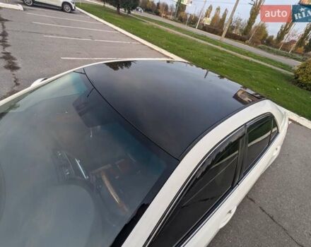 Белый Тойота Камри, объемом двигателя 2.4 л и пробегом 200 тыс. км за 11000 $, фото 2 на Automoto.ua