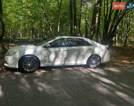 Белый Тойота Камри, объемом двигателя 2.49 л и пробегом 204 тыс. км за 13400 $, фото 3 на Automoto.ua