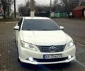 Белый Тойота Камри, объемом двигателя 2.5 л и пробегом 273 тыс. км за 12200 $, фото 1 на Automoto.ua