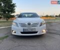 Белый Тойота Камри, объемом двигателя 2.4 л и пробегом 220 тыс. км за 9750 $, фото 1 на Automoto.ua