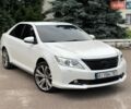 Белый Тойота Камри, объемом двигателя 2.49 л и пробегом 247 тыс. км за 11700 $, фото 1 на Automoto.ua