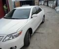 Белый Тойота Камри, объемом двигателя 2.5 л и пробегом 201 тыс. км за 10500 $, фото 1 на Automoto.ua