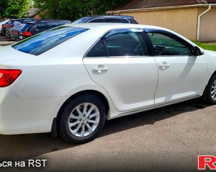 Белый Тойота Камри, объемом двигателя 2.5 л и пробегом 176 тыс. км за 13800 $, фото 2 на Automoto.ua