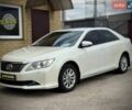 Белый Тойота Камри, объемом двигателя 2.49 л и пробегом 279 тыс. км за 10950 $, фото 1 на Automoto.ua