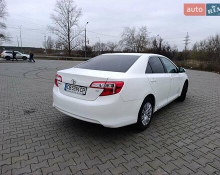 Белый Тойота Камри, объемом двигателя 2.49 л и пробегом 174 тыс. км за 9700 $, фото 5 на Automoto.ua