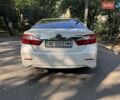 Білий Тойота Камрі, об'ємом двигуна 2.5 л та пробігом 136 тис. км за 14700 $, фото 1 на Automoto.ua