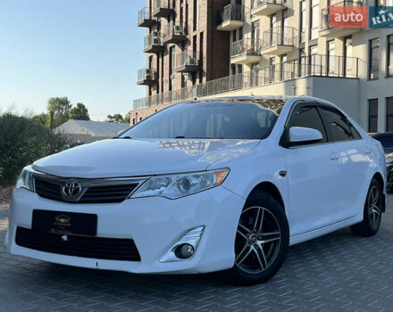 Білий Тойота Камрі, об'ємом двигуна 2.49 л та пробігом 230 тис. км за 10500 $, фото 1 на Automoto.ua