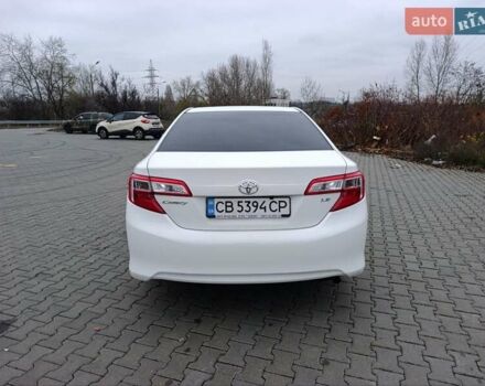 Белый Тойота Камри, объемом двигателя 2.49 л и пробегом 174 тыс. км за 9700 $, фото 3 на Automoto.ua