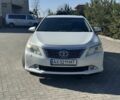 Белый Тойота Камри, объемом двигателя 2.5 л и пробегом 255 тыс. км за 10600 $, фото 1 на Automoto.ua