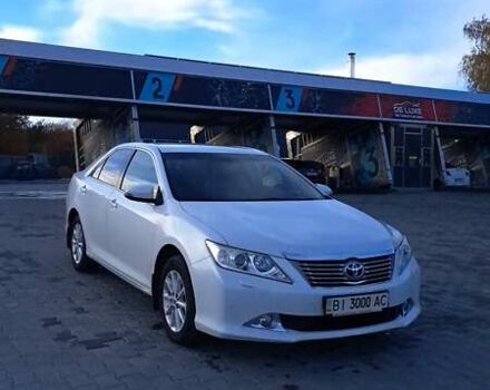 Белый Тойота Камри, объемом двигателя 2.5 л и пробегом 195 тыс. км за 11800 $, фото 1 на Automoto.ua