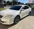Белый Тойота Камри, объемом двигателя 2.5 л и пробегом 174 тыс. км за 13500 $, фото 1 на Automoto.ua