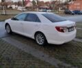 Белый Тойота Камри, объемом двигателя 2.5 л и пробегом 220 тыс. км за 14500 $, фото 14 на Automoto.ua