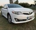 Белый Тойота Камри, объемом двигателя 2.49 л и пробегом 178 тыс. км за 10700 $, фото 1 на Automoto.ua