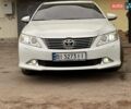 Белый Тойота Камри, объемом двигателя 2.49 л и пробегом 205 тыс. км за 11800 $, фото 1 на Automoto.ua
