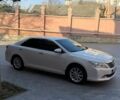Белый Тойота Камри, объемом двигателя 3.46 л и пробегом 245 тыс. км за 13500 $, фото 1 на Automoto.ua