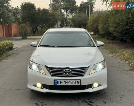 Белый Тойота Камри, объемом двигателя 2.5 л и пробегом 106 тыс. км за 12300 $, фото 1 на Automoto.ua