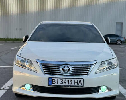 Белый Тойота Камри, объемом двигателя 2.5 л и пробегом 220 тыс. км за 14000 $, фото 3 на Automoto.ua