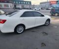 Белый Тойота Камри, объемом двигателя 2.49 л и пробегом 171 тыс. км за 17400 $, фото 1 на Automoto.ua