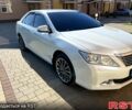 Белый Тойота Камри, объемом двигателя 2.5 л и пробегом 174 тыс. км за 15800 $, фото 1 на Automoto.ua