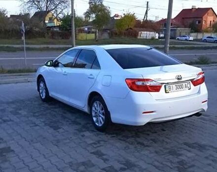 Белый Тойота Камри, объемом двигателя 2.5 л и пробегом 195 тыс. км за 11800 $, фото 3 на Automoto.ua