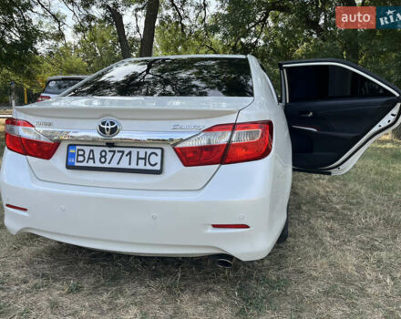 Белый Тойота Камри, объемом двигателя 2.49 л и пробегом 234 тыс. км за 14000 $, фото 3 на Automoto.ua