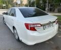 Белый Тойота Камри, объемом двигателя 2.5 л и пробегом 170 тыс. км за 9700 $, фото 3 на Automoto.ua