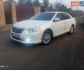Белый Тойота Камри, объемом двигателя 2.49 л и пробегом 126 тыс. км за 14900 $, фото 1 на Automoto.ua