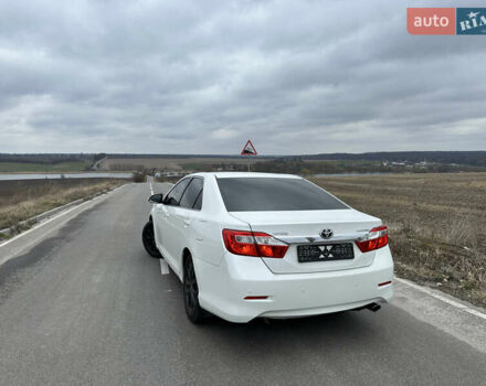 Белый Тойота Камри, объемом двигателя 2.5 л и пробегом 198 тыс. км за 13500 $, фото 14 на Automoto.ua