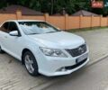 Белый Тойота Камри, объемом двигателя 2.5 л и пробегом 230 тыс. км за 12700 $, фото 1 на Automoto.ua