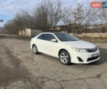 Белый Тойота Камри, объемом двигателя 2.5 л и пробегом 170 тыс. км за 9199 $, фото 1 на Automoto.ua