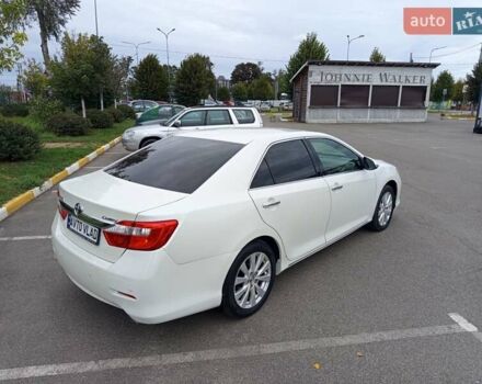 Белый Тойота Камри, объемом двигателя 2.5 л и пробегом 236 тыс. км за 13500 $, фото 13 на Automoto.ua