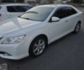 Белый Тойота Камри, объемом двигателя 2.5 л и пробегом 168 тыс. км за 11800 $, фото 1 на Automoto.ua