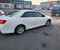 Белый Тойота Камри, объемом двигателя 2.49 л и пробегом 171 тыс. км за 17400 $, фото 1 на Automoto.ua