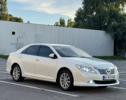 Белый Тойота Камри, объемом двигателя 2.5 л и пробегом 220 тыс. км за 14000 $, фото 6 на Automoto.ua