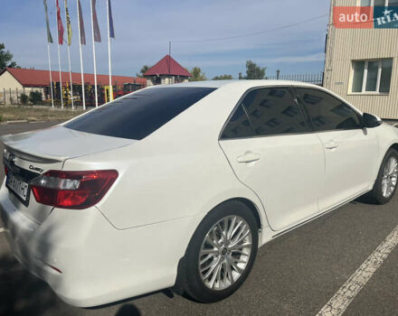 Белый Тойота Камри, объемом двигателя 2.49 л и пробегом 234 тыс. км за 14000 $, фото 5 на Automoto.ua