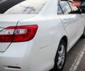 Белый Тойота Камри, объемом двигателя 2.49 л и пробегом 199 тыс. км за 13000 $, фото 1 на Automoto.ua