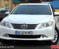 Белый Тойота Камри, объемом двигателя 2.5 л и пробегом 217 тыс. км за 15100 $, фото 1 на Automoto.ua