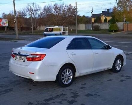 Белый Тойота Камри, объемом двигателя 2.5 л и пробегом 195 тыс. км за 11800 $, фото 4 на Automoto.ua