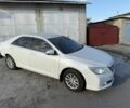 Белый Тойота Камри, объемом двигателя 2.5 л и пробегом 178 тыс. км за 8800 $, фото 1 на Automoto.ua