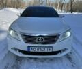 Белый Тойота Камри, объемом двигателя 2.5 л и пробегом 234 тыс. км за 11999 $, фото 1 на Automoto.ua