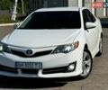 Белый Тойота Камри, объемом двигателя 2.49 л и пробегом 206 тыс. км за 11400 $, фото 1 на Automoto.ua