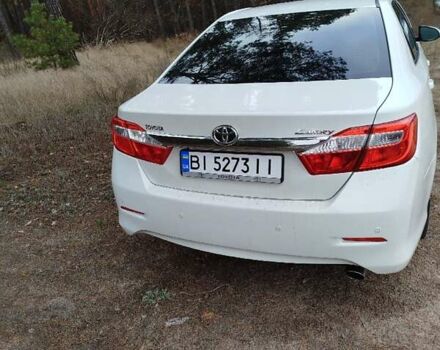 Білий Тойота Камрі, об'ємом двигуна 2.5 л та пробігом 196 тис. км за 11750 $, фото 13 на Automoto.ua