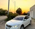 Белый Тойота Камри, объемом двигателя 2.5 л и пробегом 154 тыс. км за 15500 $, фото 1 на Automoto.ua